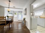 Just down the hall, you will find the dining room and kitchen